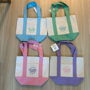 Trader Joe’s special edition mini Tote Bags (4) - Pink, Purple, Green & Blue.